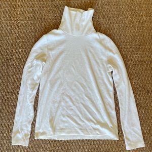 Uniqlo small fleece turtleneck. Never worn.